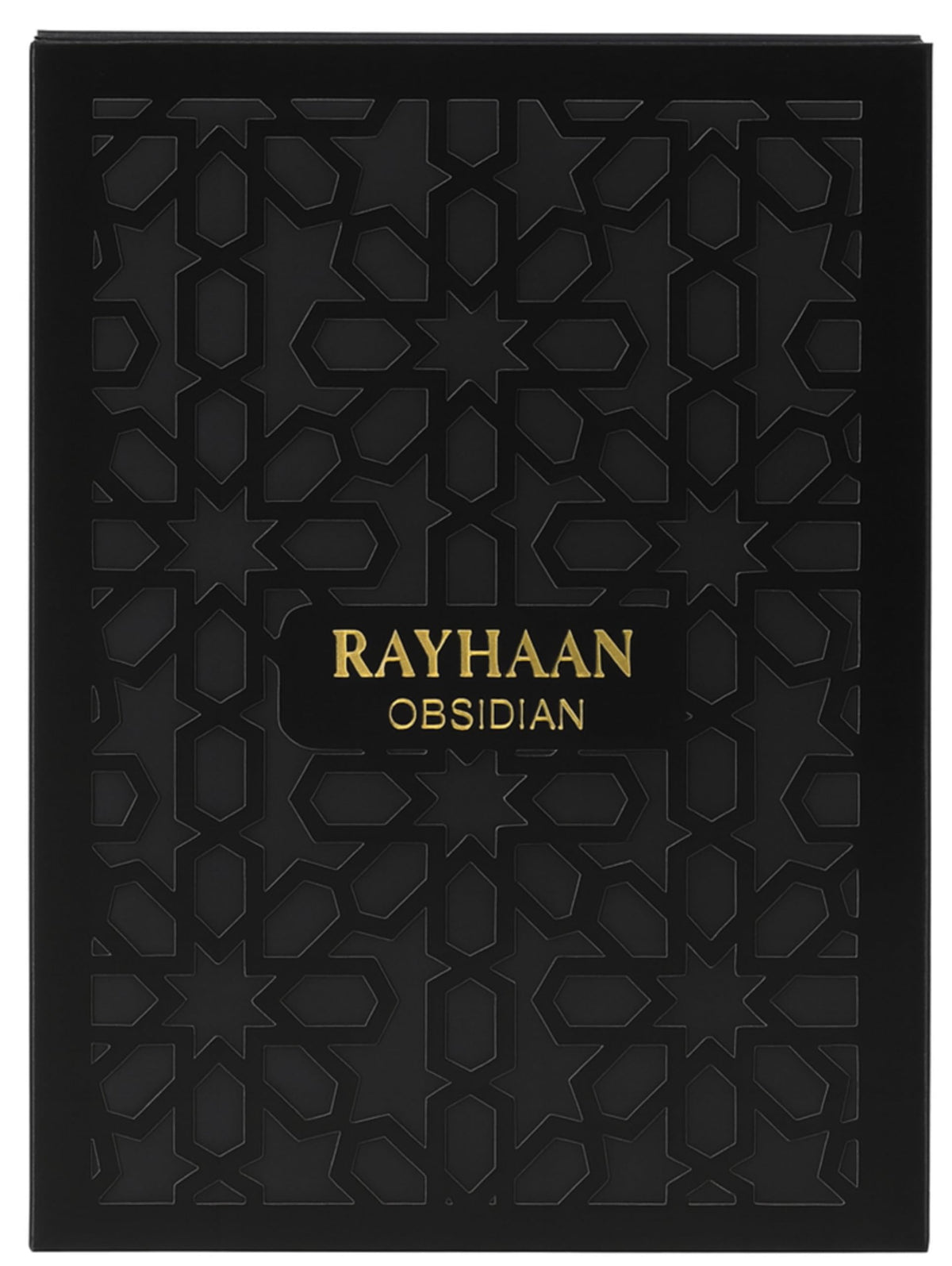 Rayhaan Obsidian sprayed on wrist in evening setting illustrating long-lasting warm woodsy trail