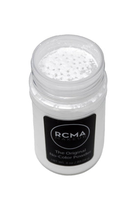 RCMA Makeup being applied with puff to set foundation and reduce shine