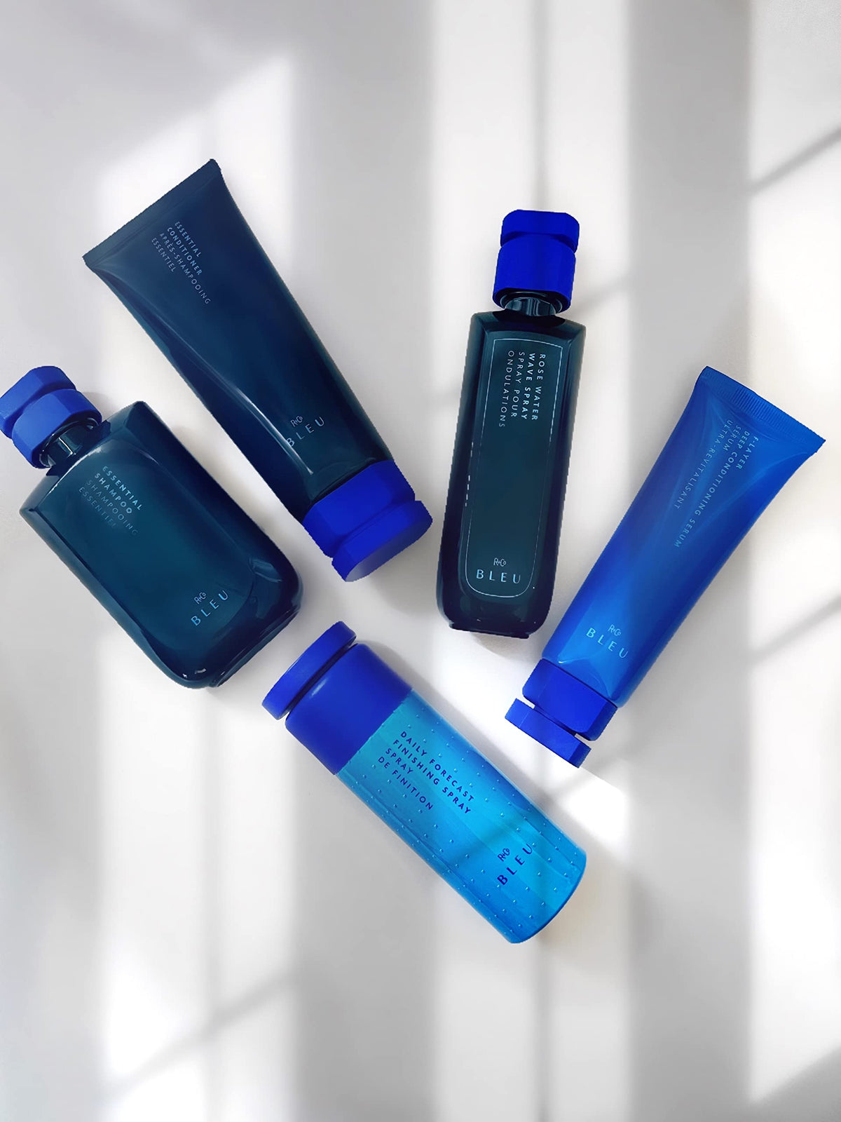 R+Co BLEU pump and label close-up highlighting ingredients and application