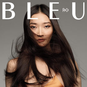 R+Co BLEU close-up of fine mist spray demonstrating even application benefit