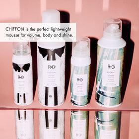 Hand applying R+Co Chiffon for smooth, shapeable hold