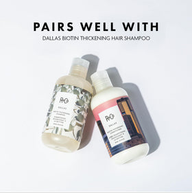 R+Co Dallas conditioner held in hand to show 8.5 oz size and scale