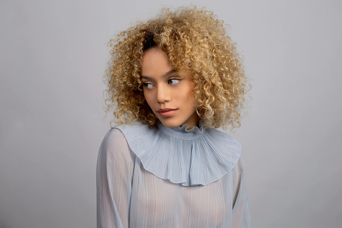 R+Co On A Cloud creamy masque texture close-up showing rich consistency for deep conditioning