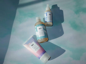 R+Co On A Cloud on a bathroom shelf in lifestyle shot implying salon-quality at-home care