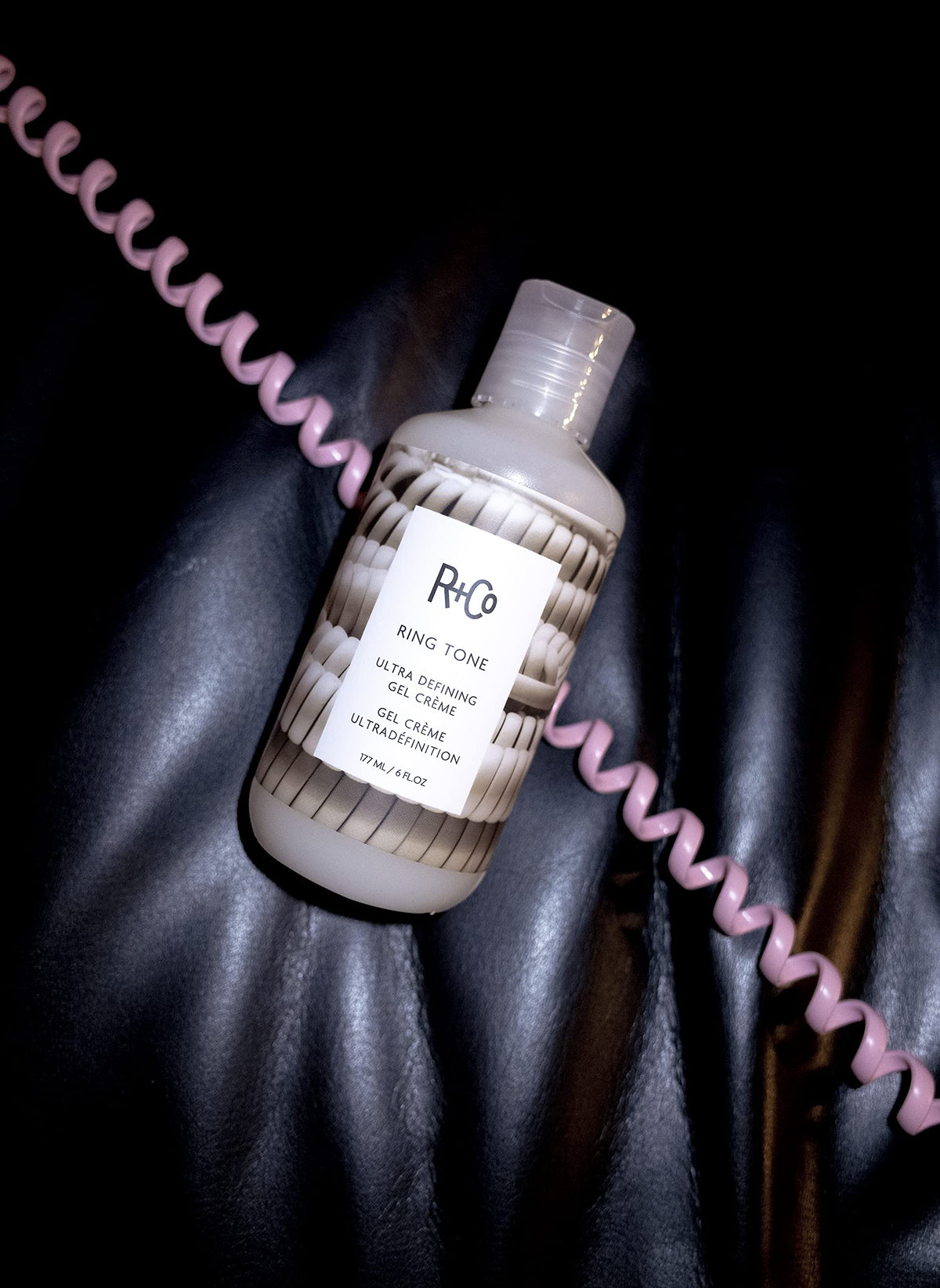 R+Co 177 ml jar held in hand illustrating real size and travel-friendly packaging benefit