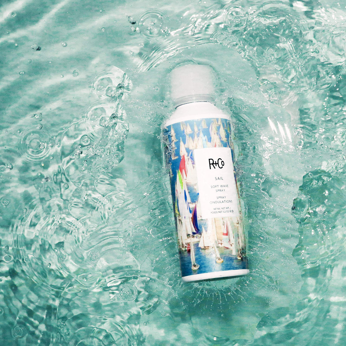 R+Co Sail texture close-up highlighting fine mist and non-sticky finish for soft waves