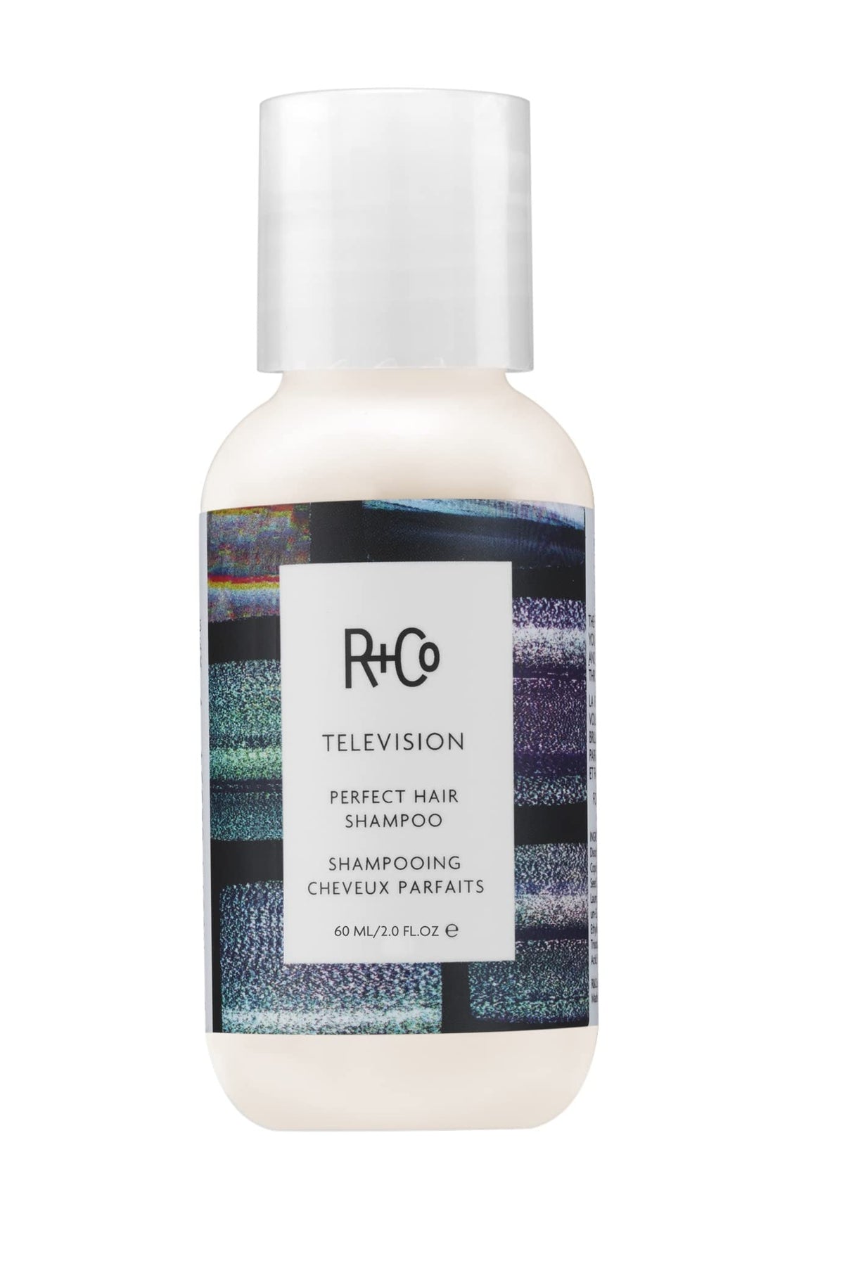 R+Co TELEVISION front packaging showing travel-size bottle and branding benefit