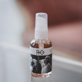 R+Co pump dispensing Two Way Mirror oil with controlled pour for easy dosing