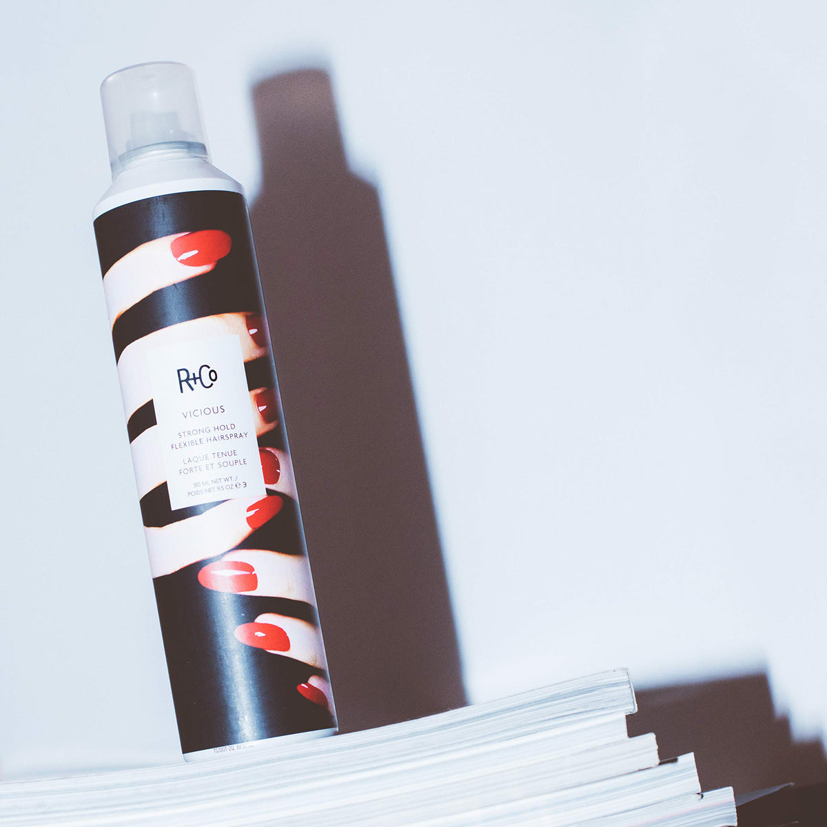 R+Co Vicious bottle on vanity illustrating sustainable packaging and lifestyle