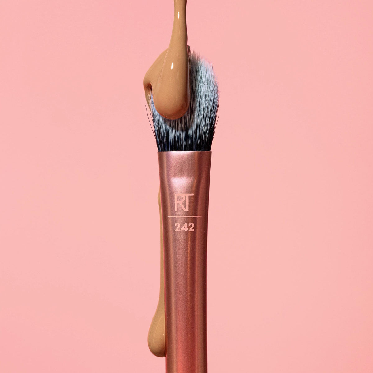 Real Techniques applying concealer under eye for precise brightening and crease-free finish