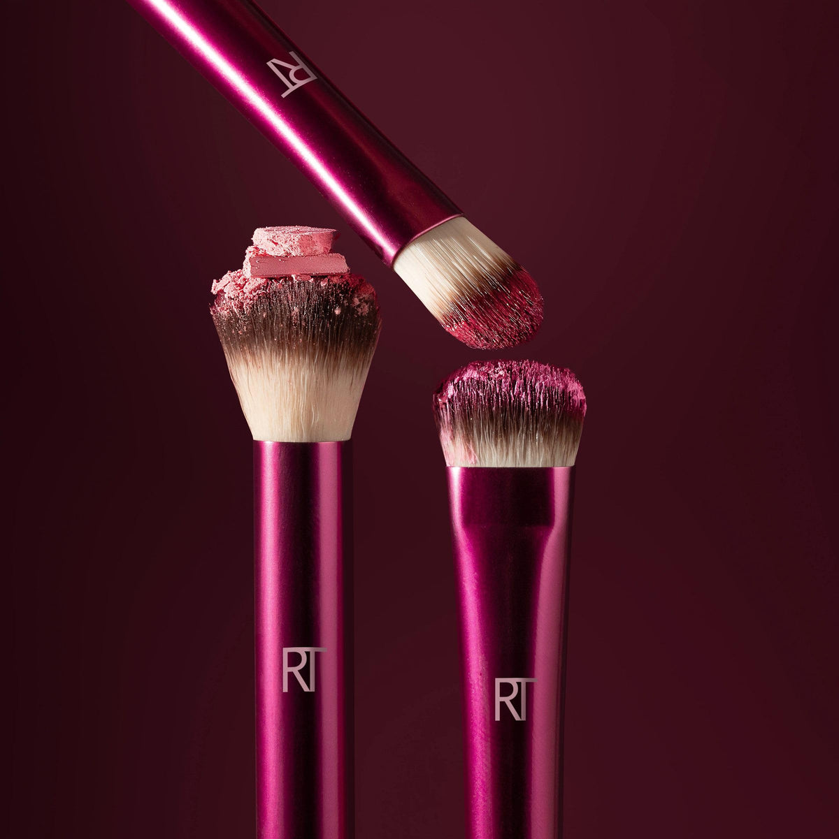 Real Techniques brushes inside a compact makeup bag for travel convenience and on-the-go touch-ups