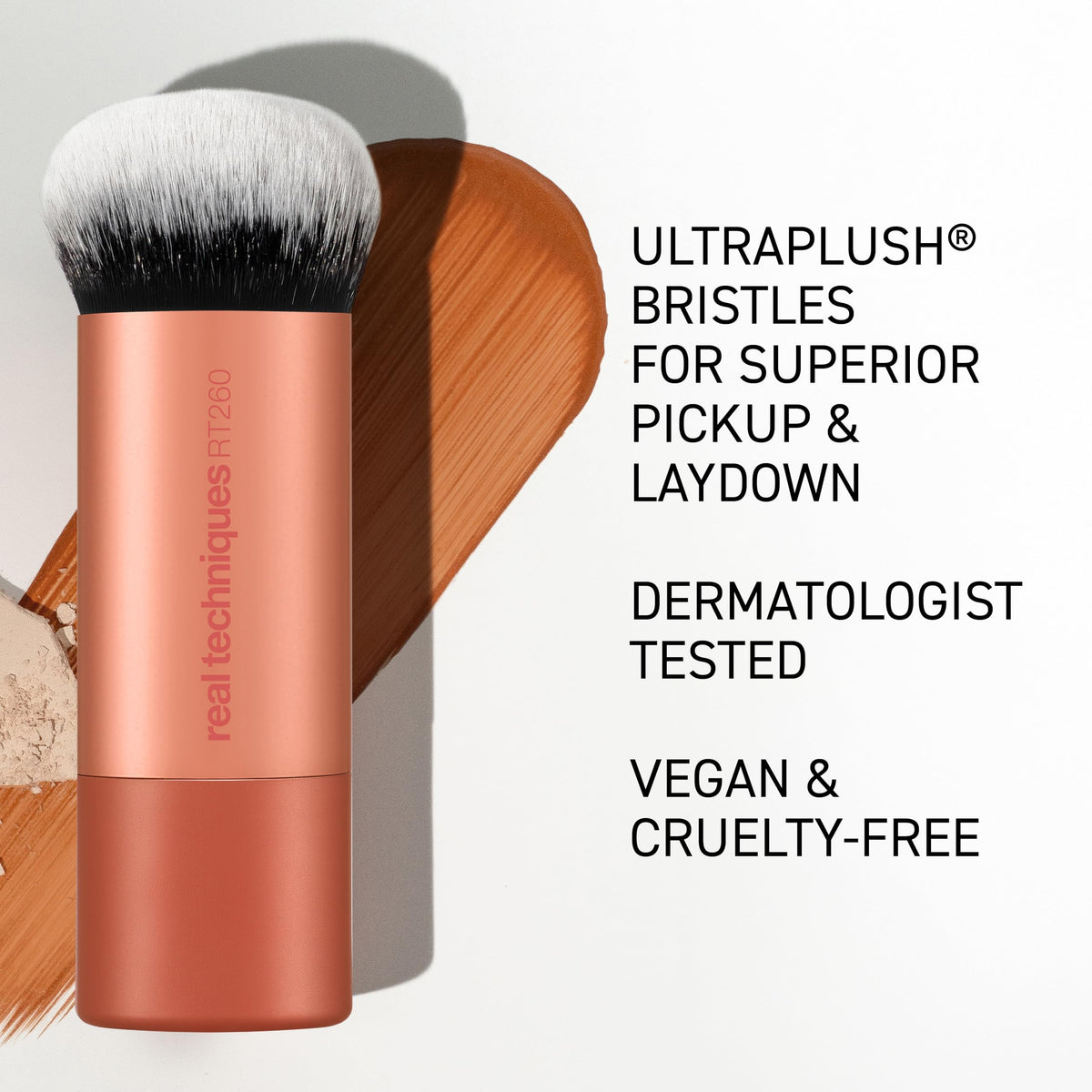 Real Techniques brush applying cream blush for seamless color payoff