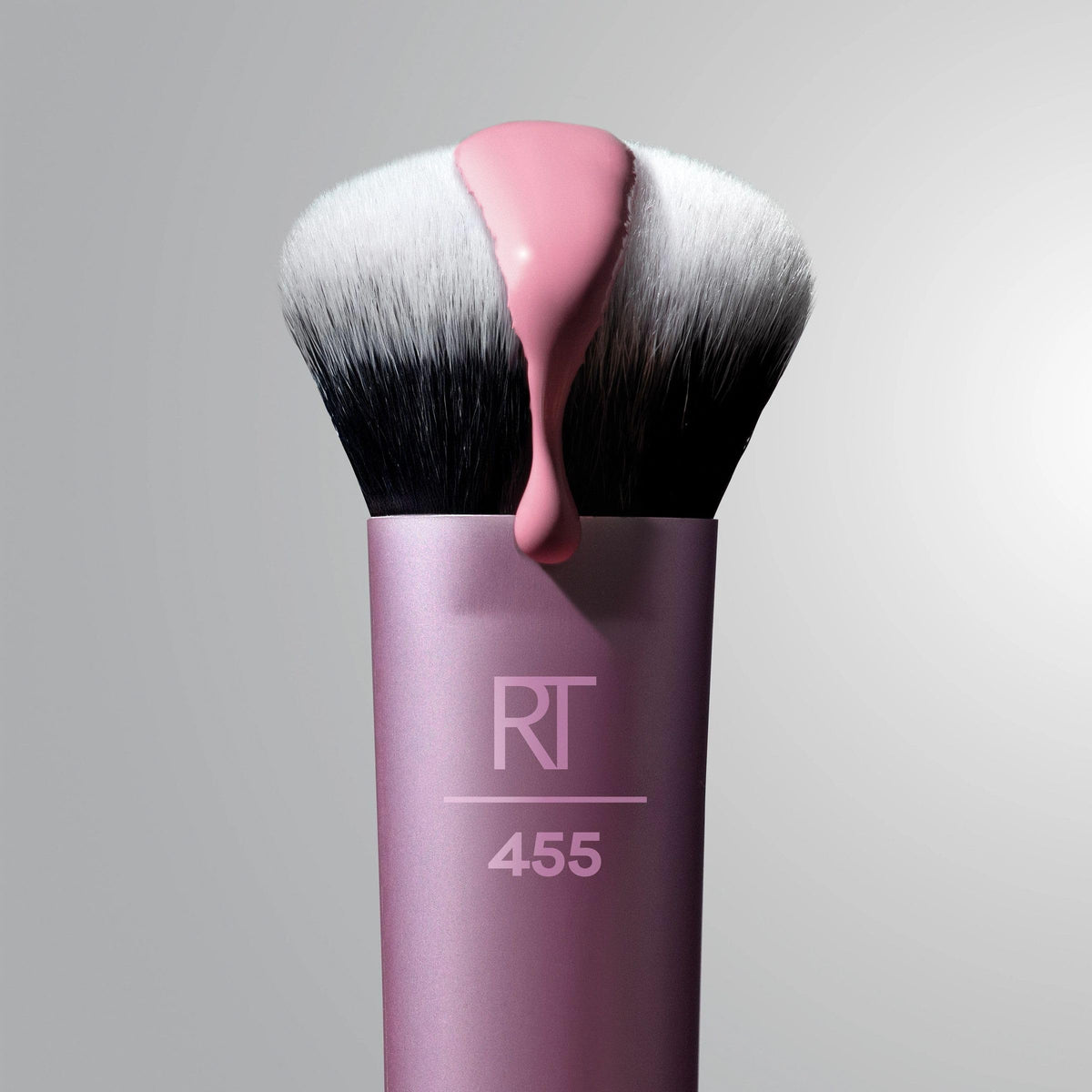 Real Techniques Cat Paw in use applying cream blush for a lifted, natural finish