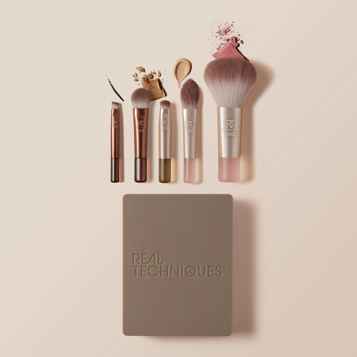 Real Techniques applying eyeshadow with mini brush demonstrating precise blending control