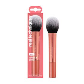 Real Techniques powder brush front view showing large domed head for even application
