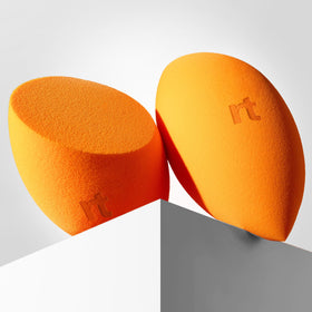 Real Techniques size comparison in hand showing compact, travel-friendly benefit