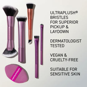 Real Techniques brushes next to coin to show compact size and travel-friendly scale