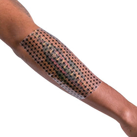 Recovery Aftercare transparent film applied to skin keeping tattoo visible and protected