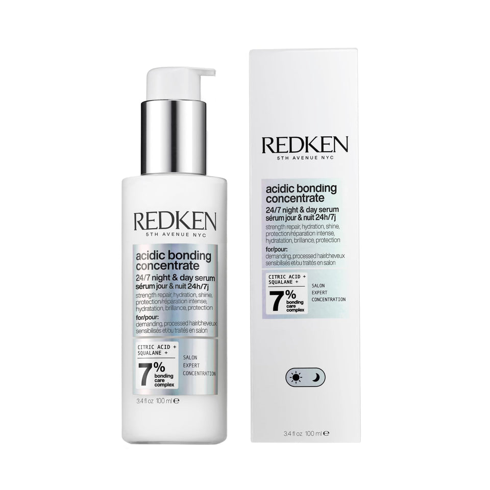 Redken bottle front view showing branding and repair purpose