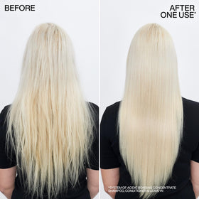 Redken conditioner applied in wet hair showing conditioning effect