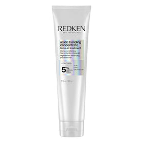 Redken bottle front packaging showing product and benefit of bond repair