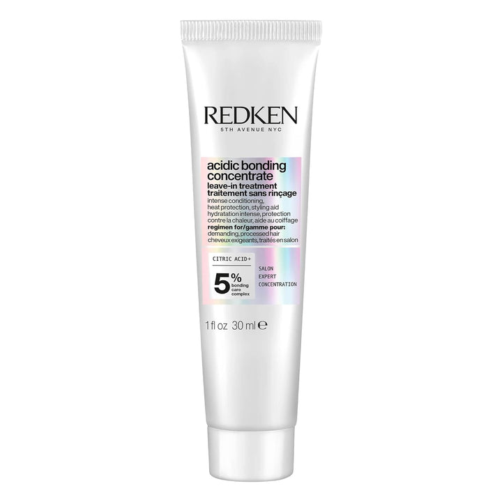 Redken bottle front packaging showing product name and benefit