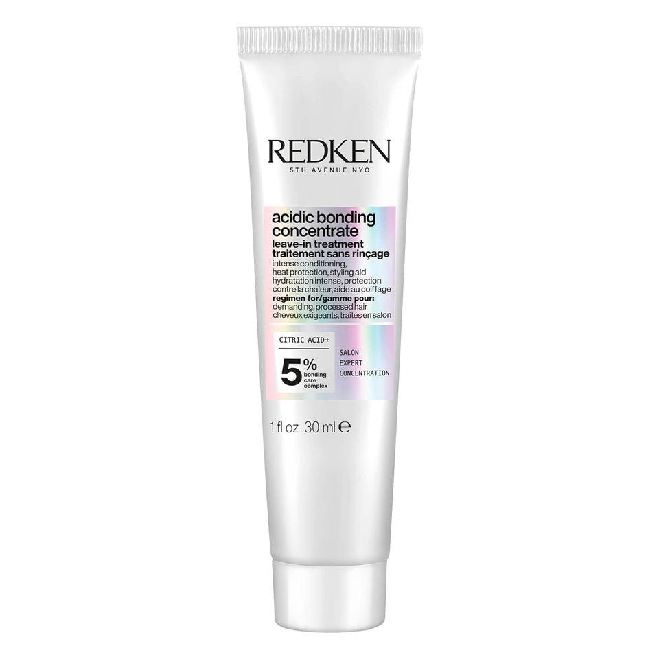 Redken bottle front packaging showing product name and benefit