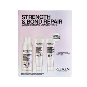 Redken bottle front packaging showing kit contents and travel benefit