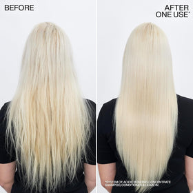 Redken acidic bonding shampoo lather in hand for effective cleansing