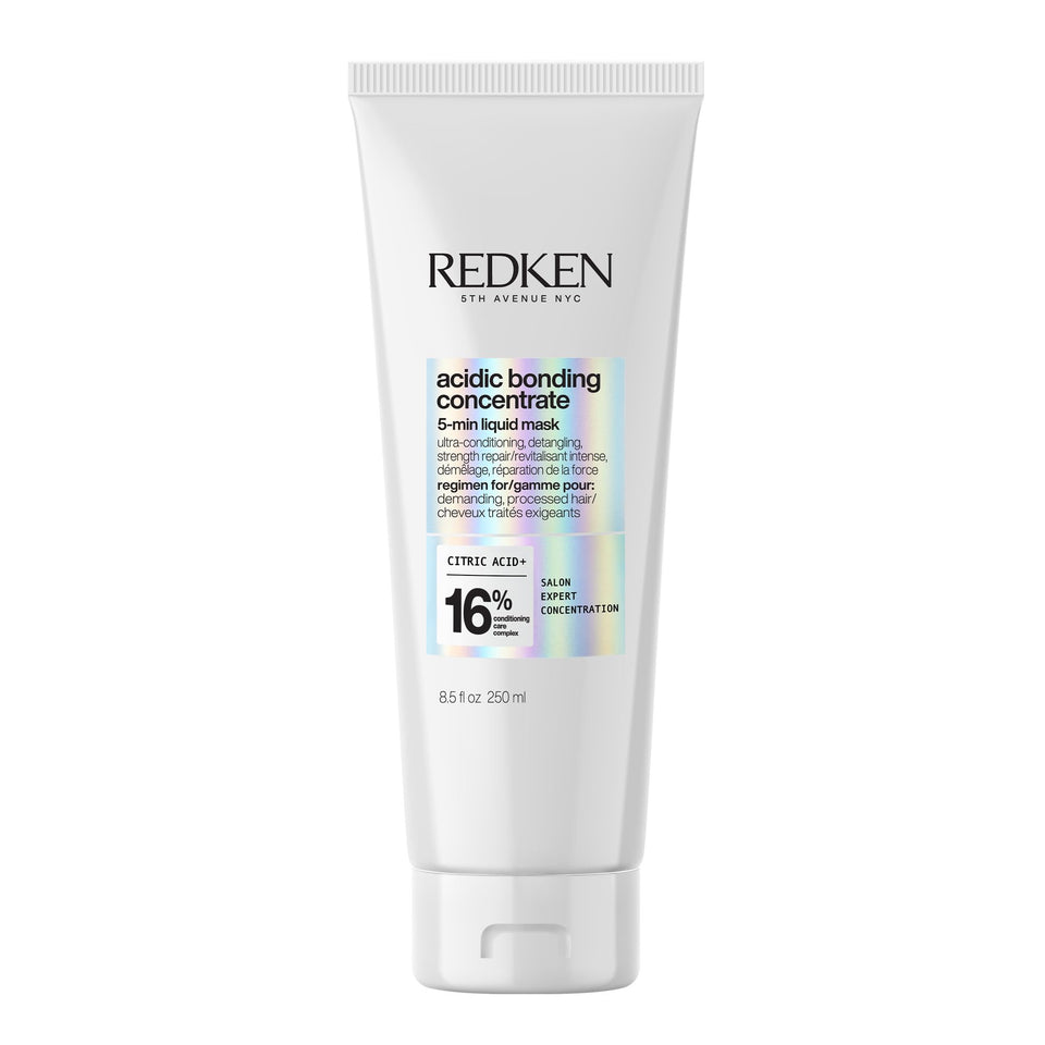 Redken bottle front packaging showing product and benefits