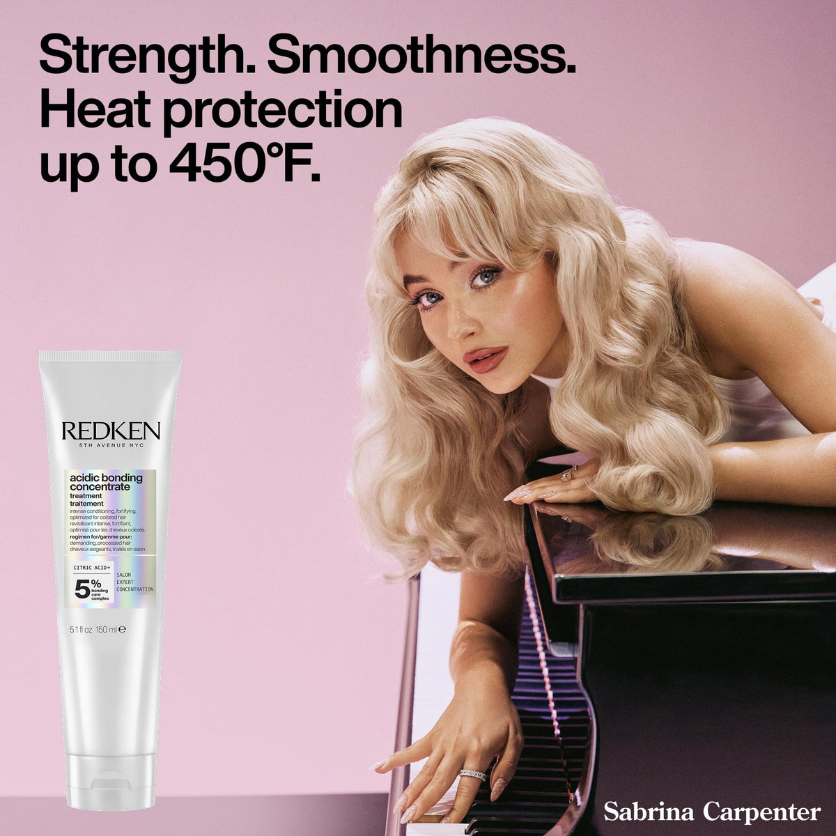 Redken bottle held in hand for size comparison and travel convenience