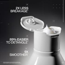 Redken texture close-up of creamy conditioner highlighting concentrated formula benefit