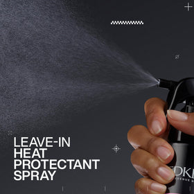 Redken bottle beside common items for scale showing travel-friendly size
