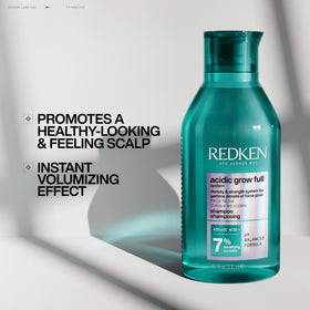Redken bottle staged in bathroom, suggests everyday routine convenience