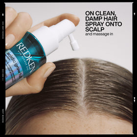 Redken serum styled on a bathroom shelf with plants suggesting daily routine integration