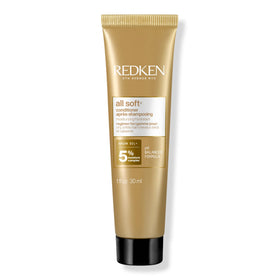 Redken bottle front travel size showing brand and moisturizing benefit