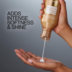 Redken All Soft bottle with argan nuts in lifestyle scene for natural moisture