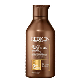 Redken front bottle showing label and hydrating shampoo for soft curls
