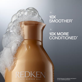 Redken brand close-up of pump and label highlighting product details and ease