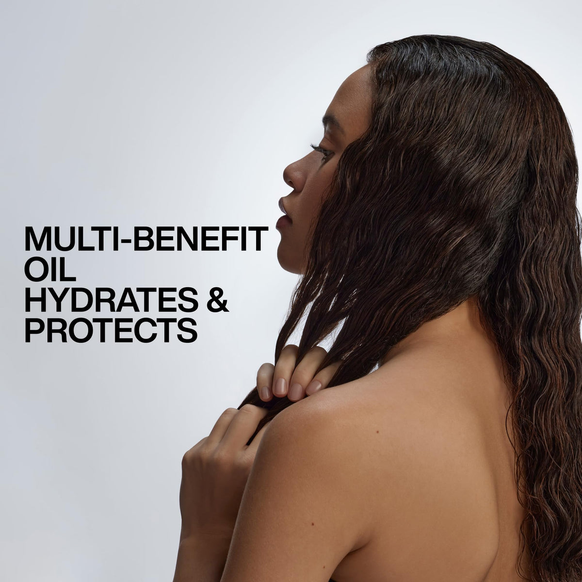 Redken All Soft Argan-6 label close-up highlighting argan oil and moisture complex ingredients