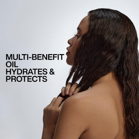 Redken All Soft Argan-6 label close-up highlighting argan oil and moisture complex ingredients