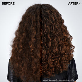 Redken oil drop close-up highlighting smooth texture that moisturizes and tames frizz