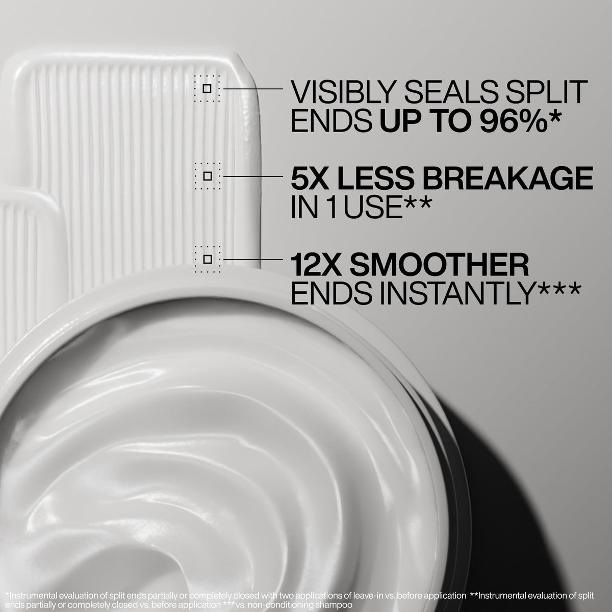 Redken bandage balm pump nozzle close-up for precise dispensing