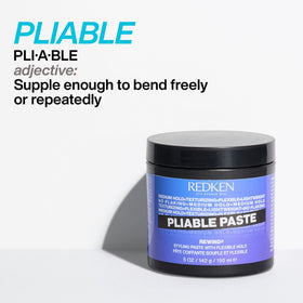 Woman with beach waves styled using Redken paste, natural movement and flexible definition