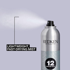 Redken Brushable Hairspray fine mist spraying from can to show light, even application for workable hold