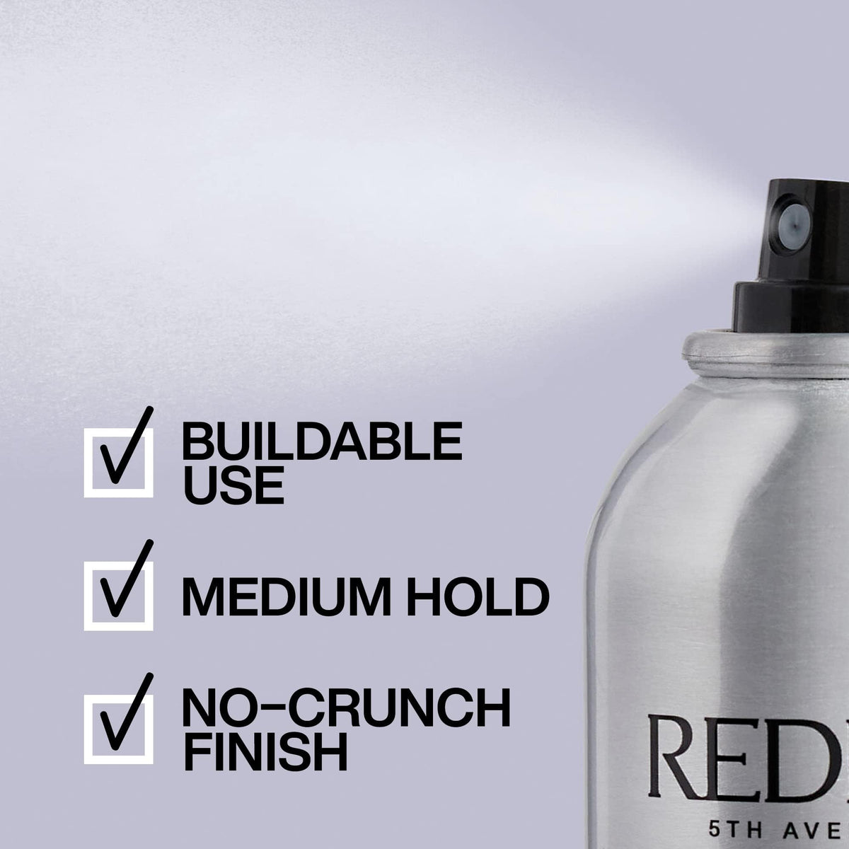 Redken Brushable Hairspray held in hand for scale demonstrating convenient 10.4 oz size for travel