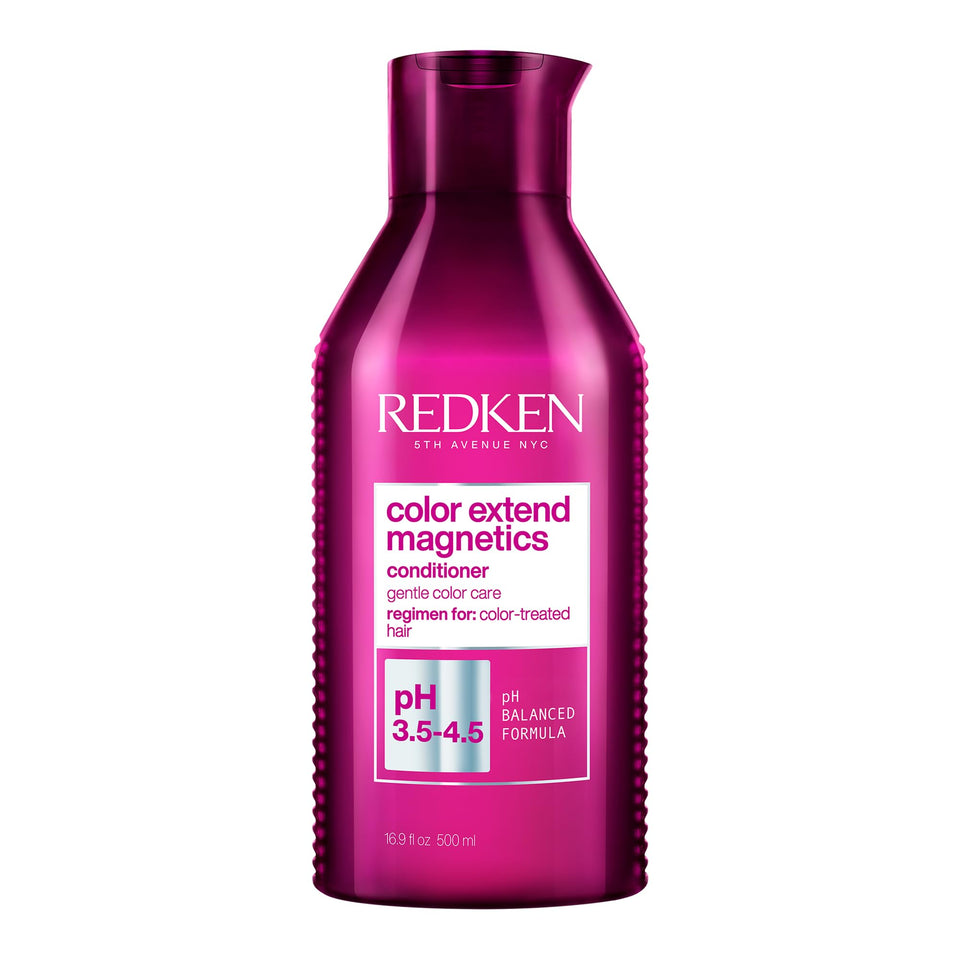 Redken conditioner front bottle showing brand and color-protecting benefit