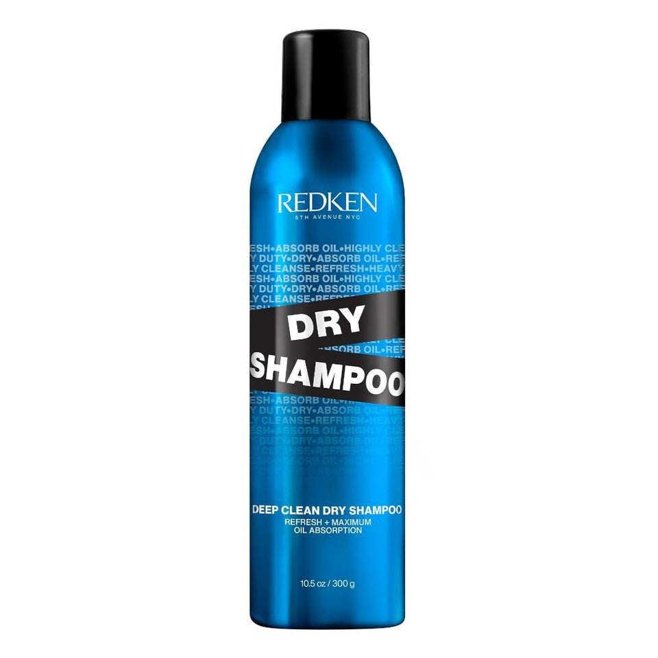 Redken can front packaging showing product and benefit of oil absorption
