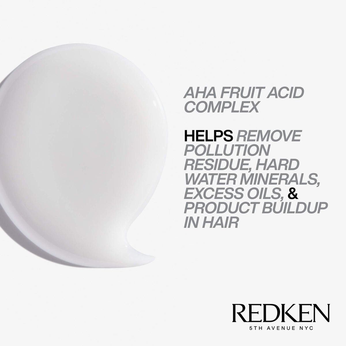 Redken bottle on bathroom shelf suggesting routine use and shiny hair results