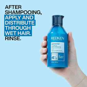Redken Extreme Conditioner next to ruler showing 10.1 fl oz size and value